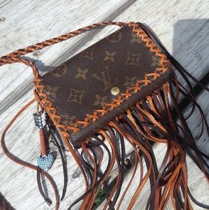 Fringed Louis Vuitton wallet 100% authentic